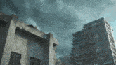 a person standing on the roof of a building with a stormy sky in the background