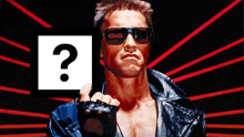a man wearing sunglasses holds up a sign with a question mark