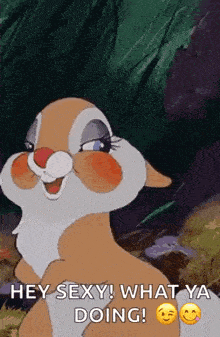 a cartoon rabbit is smiling and saying `` hey sexy what ya doing '' .