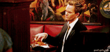Lick GIF - How I Met Your Mother Barney Stinson Licking Fried Chicken GIFs