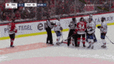 a hockey player with the number 94 on his jersey stands on the ice