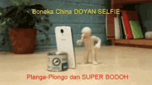 boneka china bodoh dungu selfie