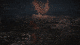 a computer generated image of a person in the water with fire coming out of their mouth