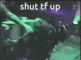 a person is laying on their back with the words shut tf up written on the bottom