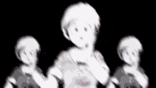 a group of anime characters are dancing together in a black and white photo .
