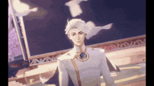 a man with white hair is standing in front of a sign that says ' nnv ' on it