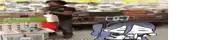 a man is standing in a store with a cartoon character behind him