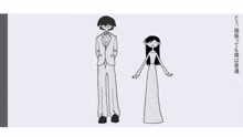 a man in a suit and a woman in a white dress are standing next to each other .