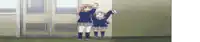 two girls in school uniforms are standing next to each other in a hallway .