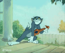 tom playing guitar tom and jerry cat dance