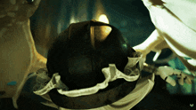 a close up of a person 's head with the letter v in the lower right corner