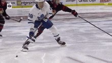 a hockey player with the number 88 on his jersey skates on the ice