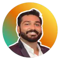 a man with a beard is smiling in a circle with a colorful background