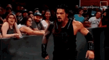 Roman Reigns Thrown Chair GIF - Roman Reigns Thrown Chair Wrestling GIFs