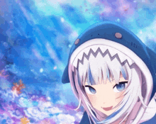 a girl with white hair and blue eyes is wearing a shark hood