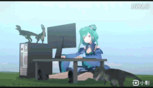 a girl with green hair is sitting at a desk using a computer .