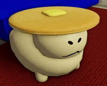 a cartoon character is wearing a pancake hat with butter on top of it .