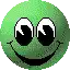 a green smiley face with big eyes and a smile on its face .