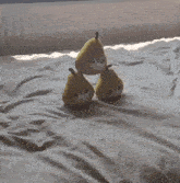 three stuffed pears are stacked on top of each other