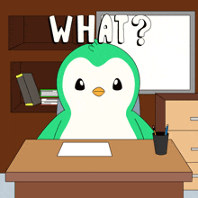 a penguin sits at a desk in front of a white board that says " what "