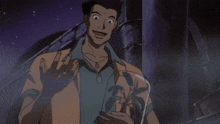 a man in an orange shirt and a blue shirt has the letter t on his chest
