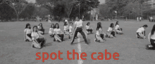 a black and white photo of a group of people with the words spot the cabe written in red