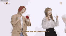 two women are dancing together with the words call me laisa love me laisa love me behind them