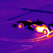a picture of a race car with smoke coming out of the tires taken by tyrannosaurus-maxy
