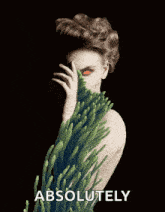 a woman covering her face with a plant and the word absolutely below