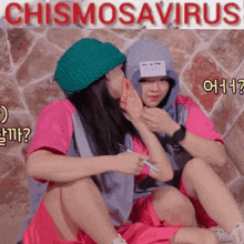two girls whispering into each other 's ear with the words chismosavirus written above them