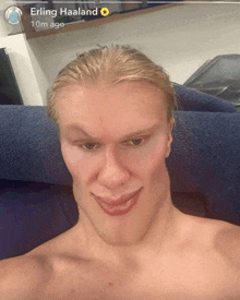 a picture of a shirtless man with the name erling haaland on the bottom