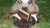 a girl in a hooded cape is holding a book