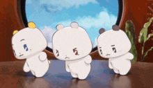 three white cartoon bears are standing in front of a window
