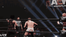 a wrestler in a ring with the word live on the bottom left