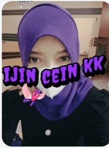 a woman wearing a purple hijab and a white mask with the words ijin cein kk written above her