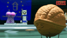 a poster for sausage party foodtown shows a walnut with a face