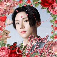 a picture of a man surrounded by flowers with the words good night written on the bottom