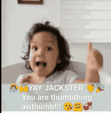 a little girl is giving a thumbs up and says yay jackster you are thumb thing awthumb !!!