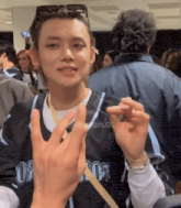 a man wearing a jersey that says ' os ' on it