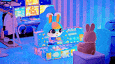 a bunny is sitting on a blue couch in a room with a computer and headphones