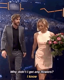 Why Didn'T I Get Any Flowers? GIF - Jennifer Lawrence Liam Hemsworth Flowers GIFs