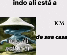 a picture of a smurf wearing a hat with the words `` indo ali esta a km indo ali estrupar '' .