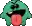 a green monster with a red tongue sticking out of its mouth .