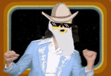 a man wearing a cowboy hat and sunglasses has a beard