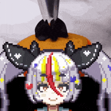 a pixel art drawing of a girl with horns and wings