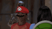 a woman wearing a red hat says " this is a "