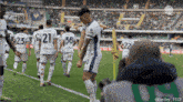a group of soccer players including number 21 and 36