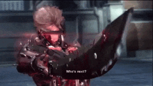 a video game character is holding a bloody sword and talking about who 's next .