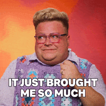 a fat man wearing glasses and a purple sweater says it just brought me so much