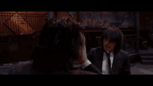 a man in a suit and tie is talking to another man who says you are totally confusing